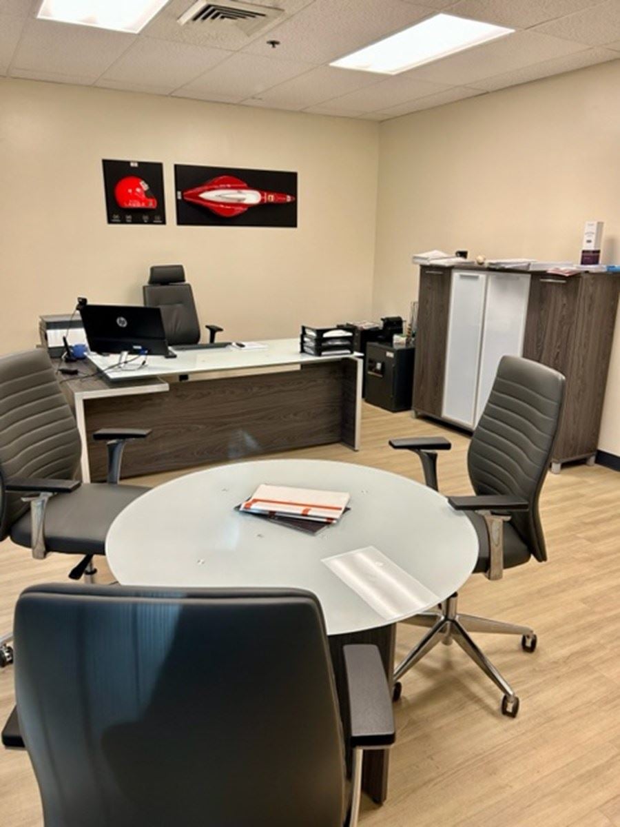 Desk, filing cabinets and meeting table