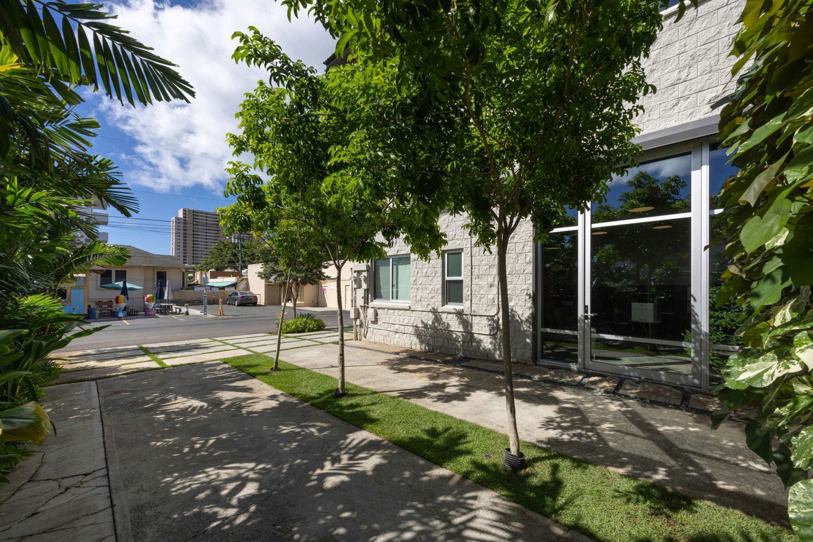 Side of building showing glass door