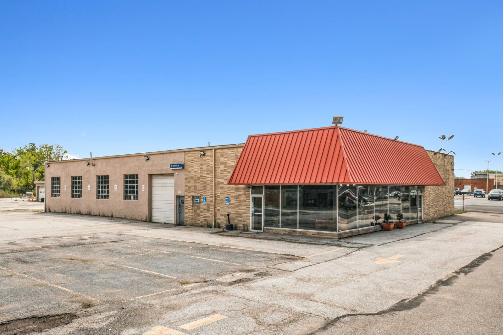 9,500 SF on 1.97 AC Former Car Dealership 1633 Pearl Road - Image 1