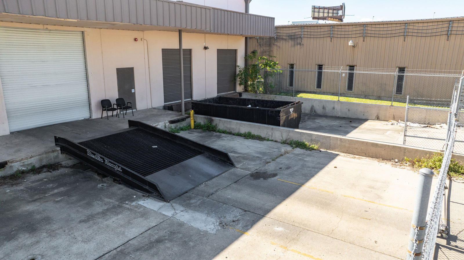 Dock High and Grade Level via Ramp