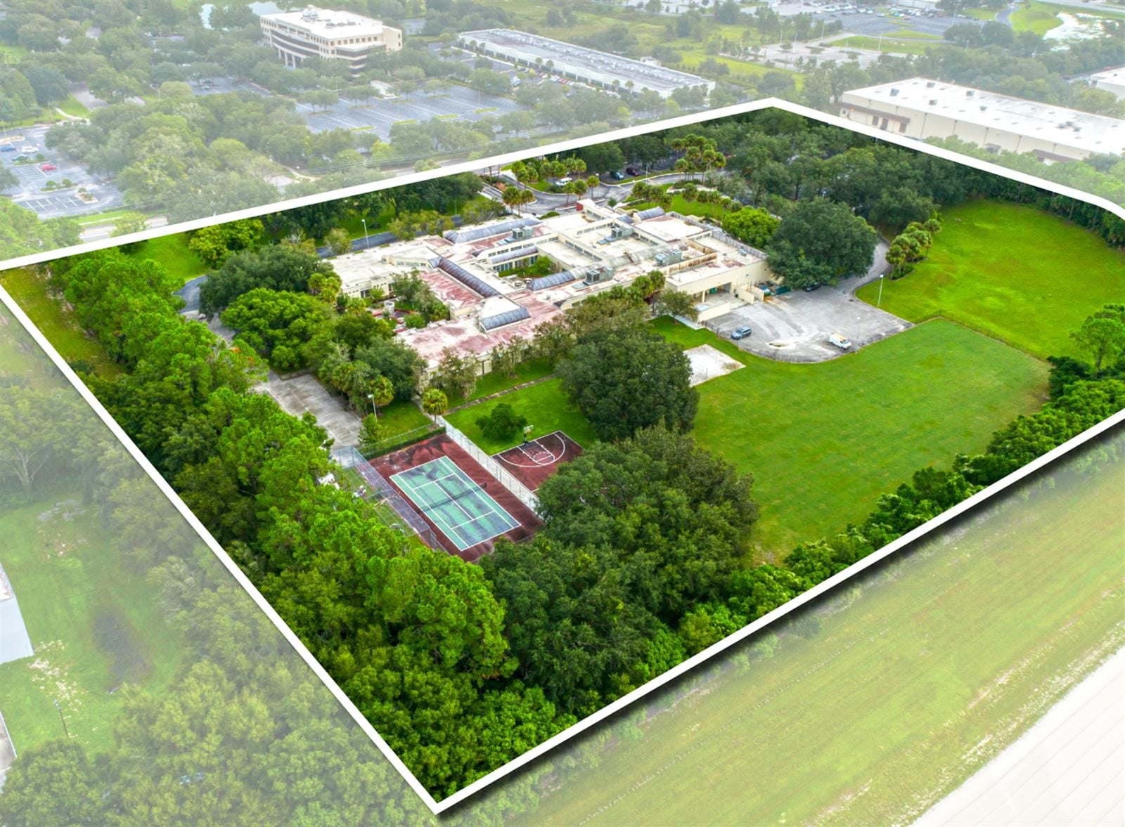 Former Dormitory | 48,552 SF ON  ±11.17 ACRES 1097 Sand Pond Road - Image 1
