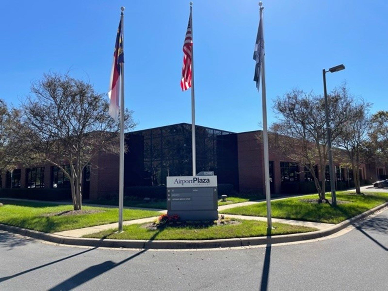 Exterior with Flags & Sign