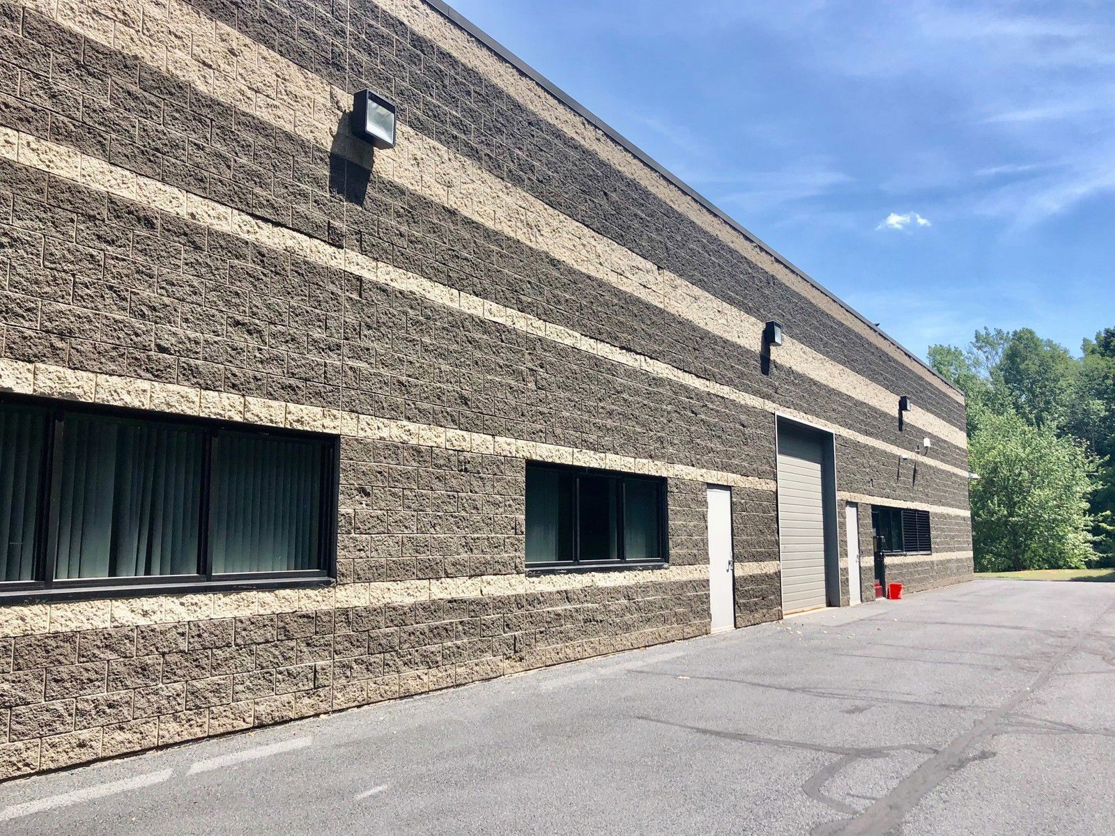 301 Hammer Mill Rd_Exterior rear showing overhead door_pic