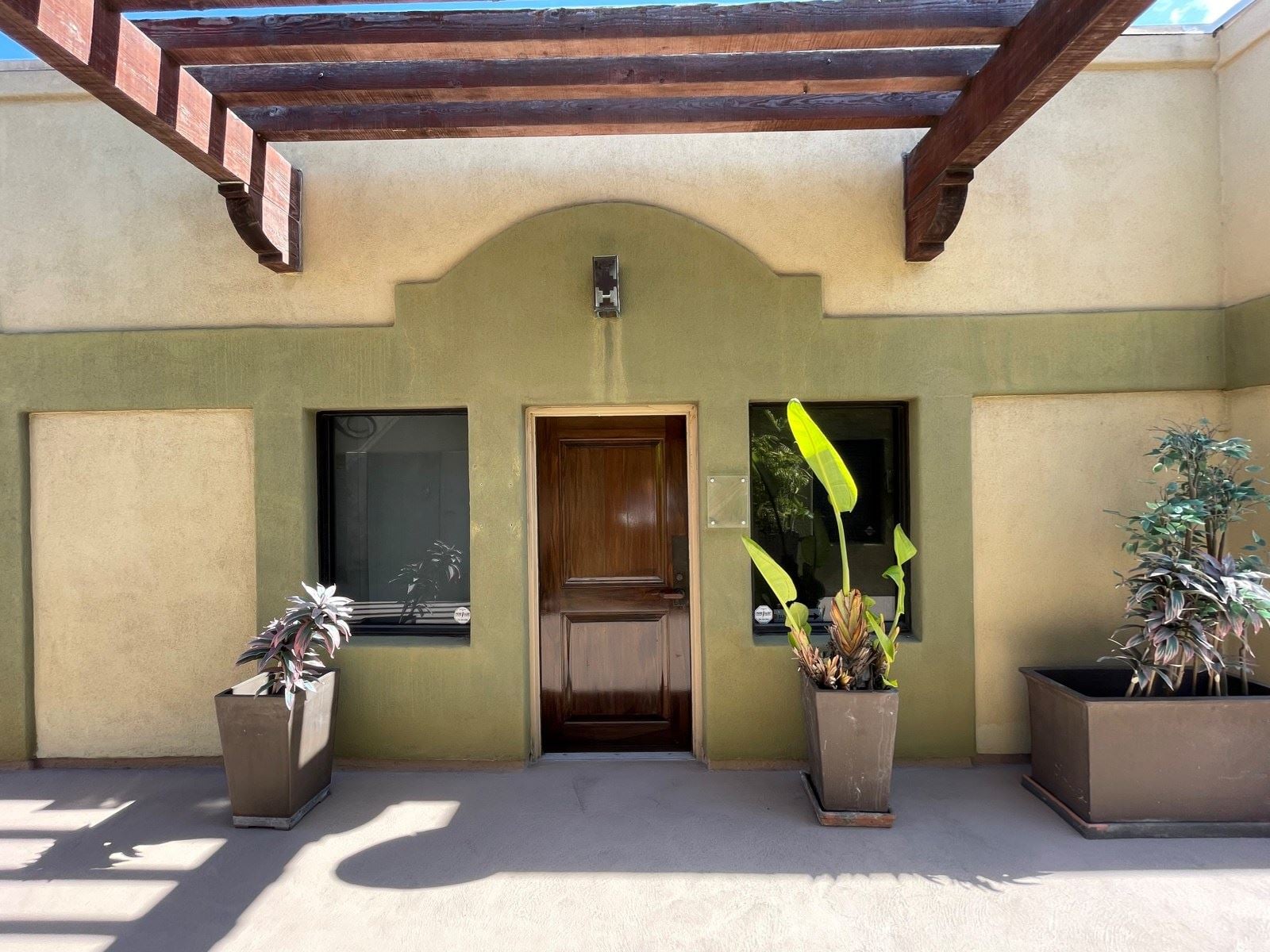 No Suite number. Contiguous with Suite 200